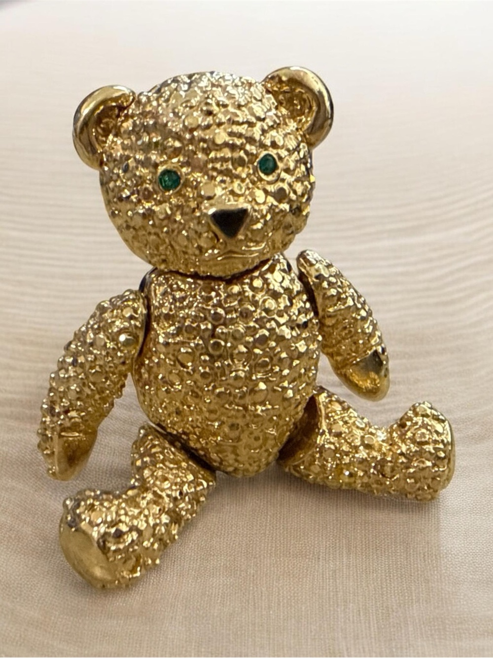 Vintage gold-tone articulated teddy bear brooch highly collectible
